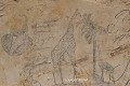 Girafe et son petit dessinés sur les parois d'un veillot ; cette représentation pourrait avoir été inspirée par Zarafa, la première girafe vivante visible en France et arrivée à Marseille en 1826 (vallée du Cher, France). Art 
 Art des carrières 
 Girafe 
 Monthou 
 Zarafa 
 carrière souterraine 
 graffiti 
 vallée du Cher 